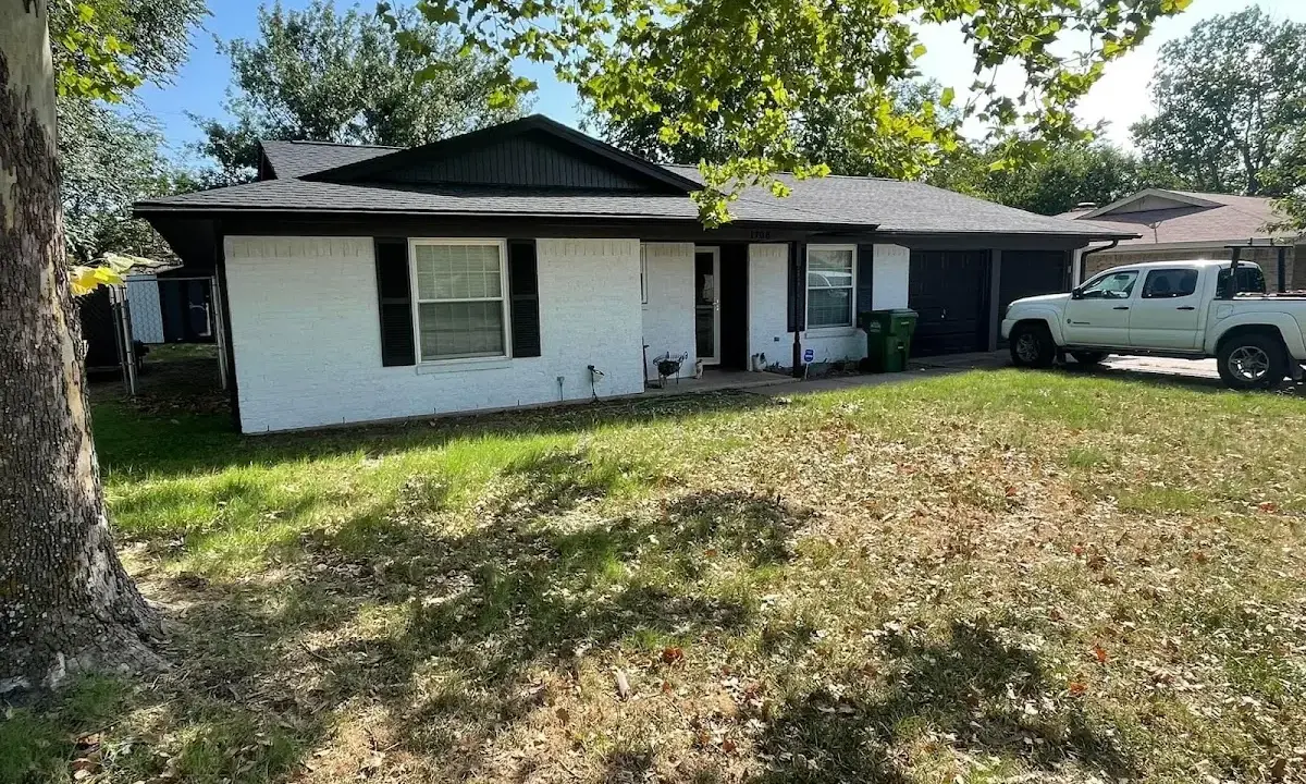 Professional roofing crew working on a residential roof in Dublin